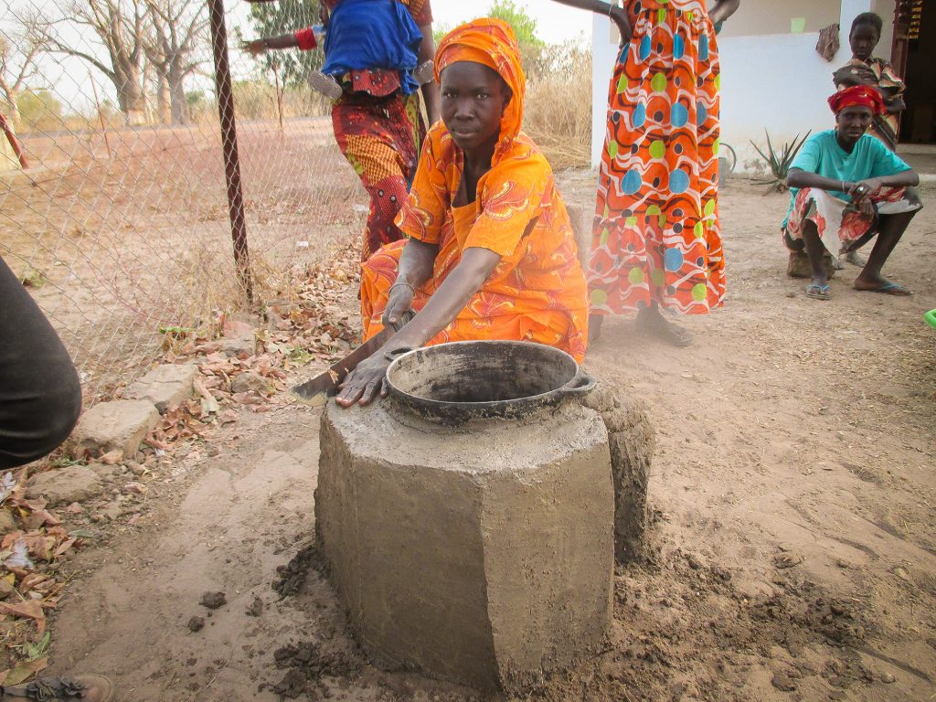 Building a cookstove to make cafe touba